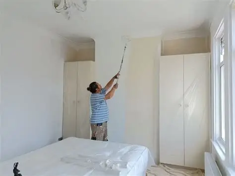 Professional interior painting service refreshing walls and ceilings in a residential property.