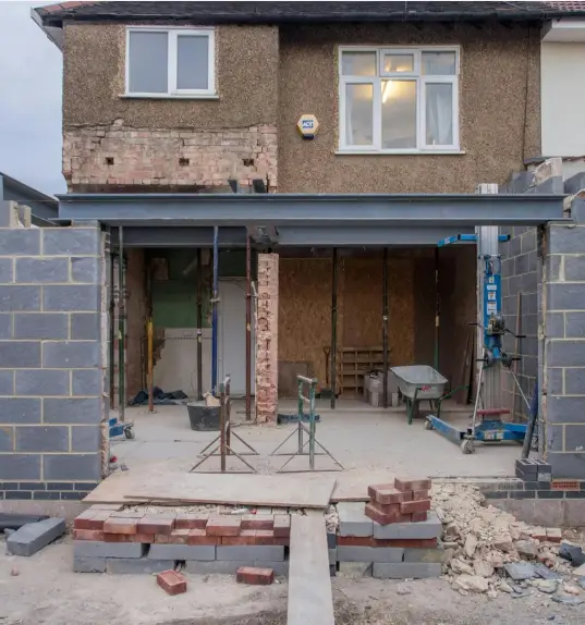 Ground-floor rear home extension and brickwork refurbishment in progress at a residential property.