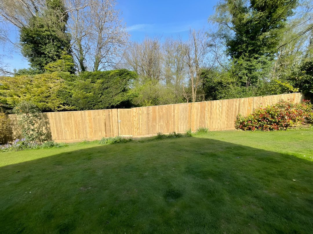 well-maintained garden lawn with wooden fencing in Slough