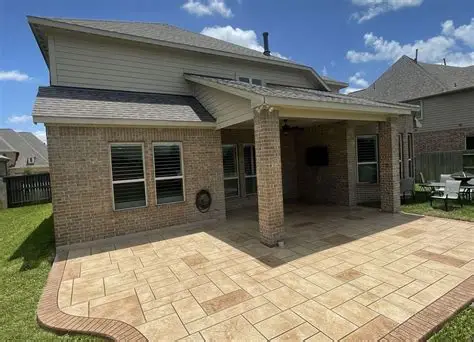 Residential patio paving installation with Indian sandstone paving in Slough
