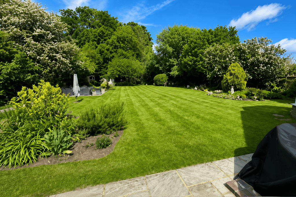 Recent hard landscaping and garden paving project with landscaped lawn in Slough